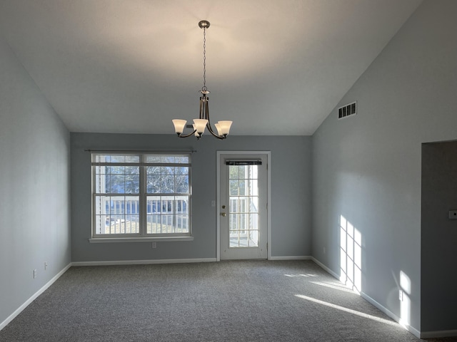 carpeted spare room featuring baseboards, visible vents, lofted ceiling, and an inviting chandelier