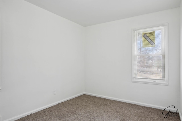 11620 Rossiter St, Detroit, MI 48224 - carpeted empty room with baseboards