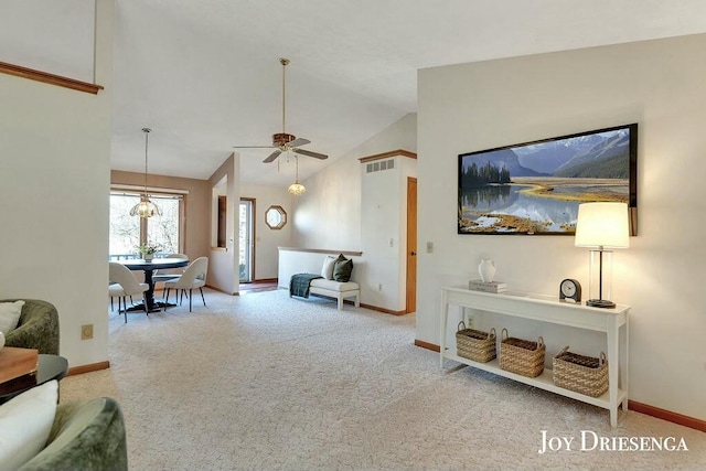 living room featuring carpet flooring, baseboards, visible vents, and high vaulted ceiling