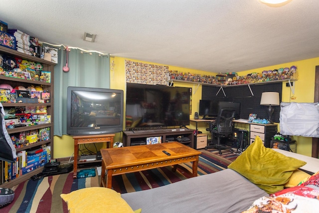 living room with visible vents, a textured ceiling, and carpet flooring