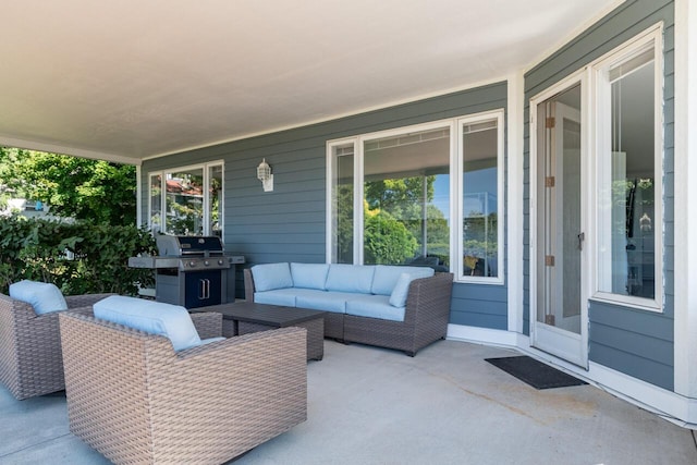 view of patio / terrace with grilling area and an outdoor hangout area