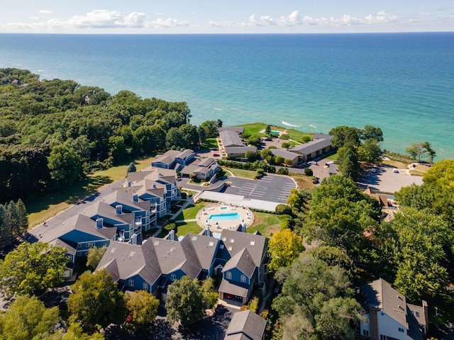 aerial view featuring a residential view and a water view