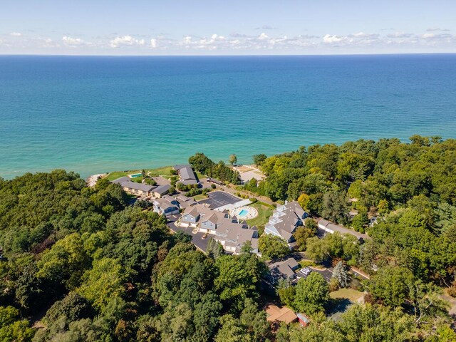 birds eye view of property with a residential view and a water view