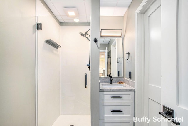 full bathroom with vanity and a shower stall