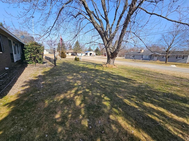 view of yard with a residential view