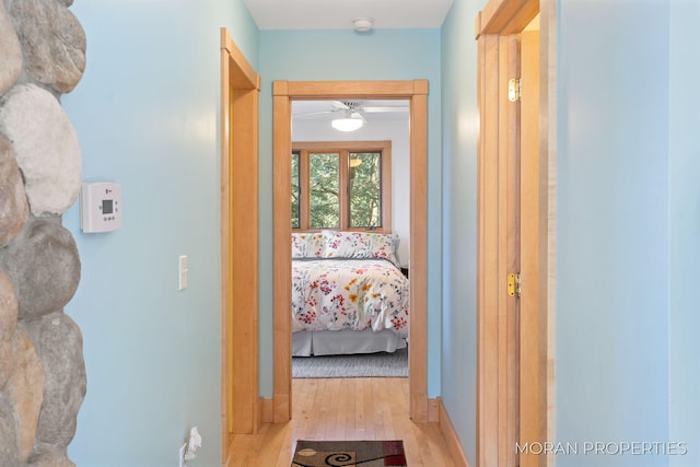 corridor with wood finished floors