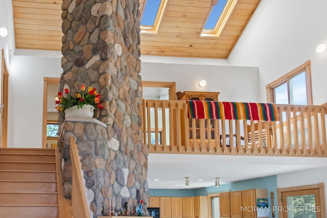 room details with wooden ceiling and a skylight