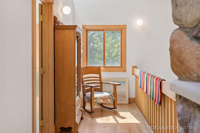 sitting room with wood finished floors