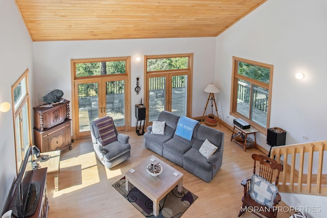 living area with light wood finished floors, french doors, high vaulted ceiling, and wooden ceiling