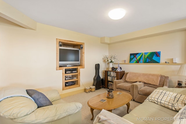 living area featuring carpet flooring