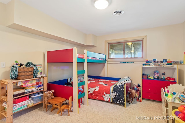 bedroom featuring visible vents