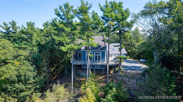 rear view of house with a deck