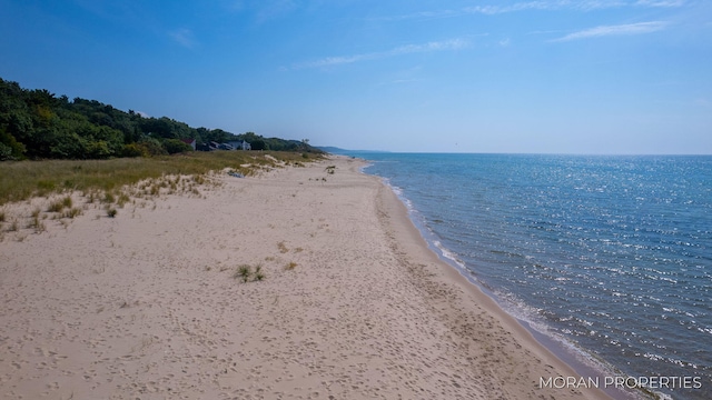 property view of water featuring a view of the beach