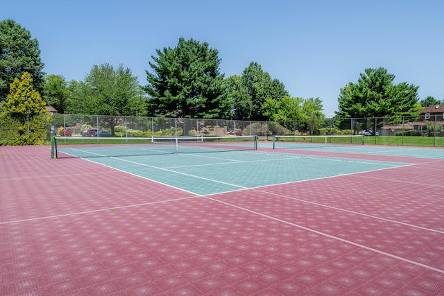 view of sport court featuring community basketball court and fence