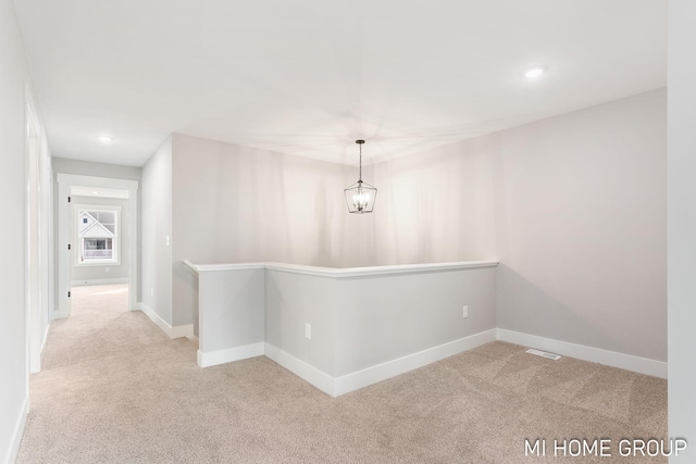 3614 Buckingham Ln Unit 37, Hudsonville, MI 49426 - corridor with carpet flooring, recessed lighting, baseboards, and a chandelier