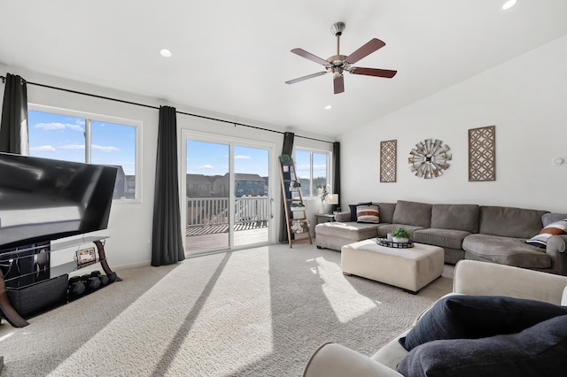 carpeted living area with recessed lighting, a ceiling fan, and vaulted ceiling