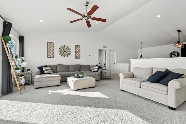 living room featuring recessed lighting, lofted ceiling, and carpet