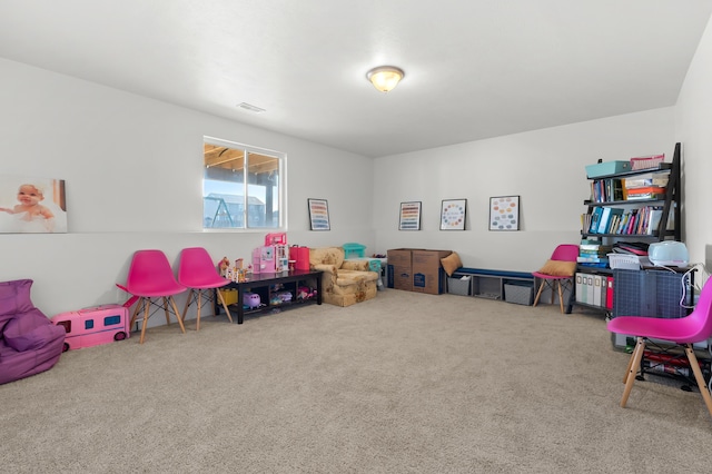 playroom with visible vents and carpet flooring