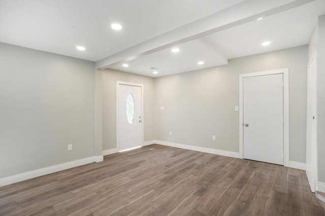 foyer with recessed lighting, baseboards, and wood finished floors