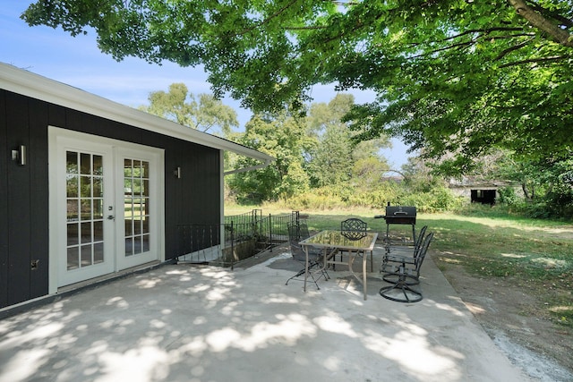 view of patio / terrace featuring outdoor dining space and french doors