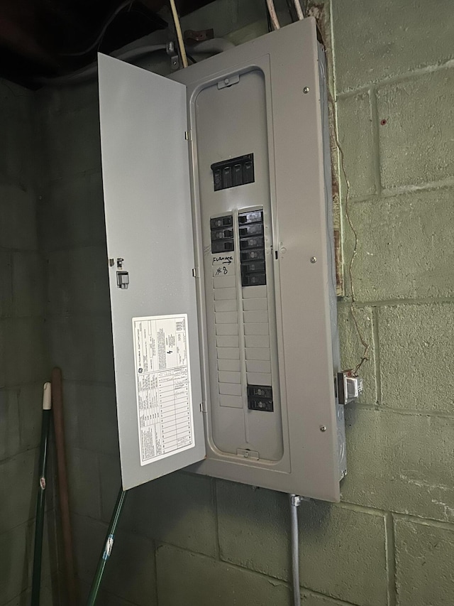 utility room featuring electric panel