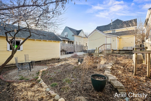 view of yard featuring a patio and fence