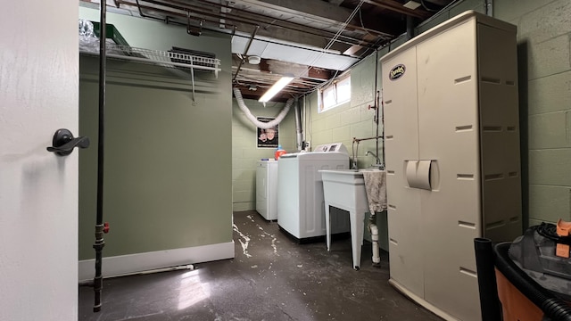 clothes washing area with laundry area and washer and dryer