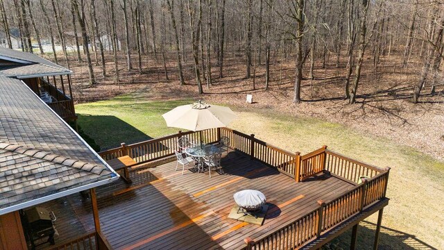 61914 M-51, Niles, MI 49120 - wooden deck with a yard, a view of trees, and outdoor dining space