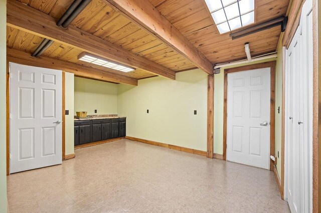 61914 M-51, Niles, MI 49120 - interior space featuring beam ceiling, wooden ceiling, and baseboards