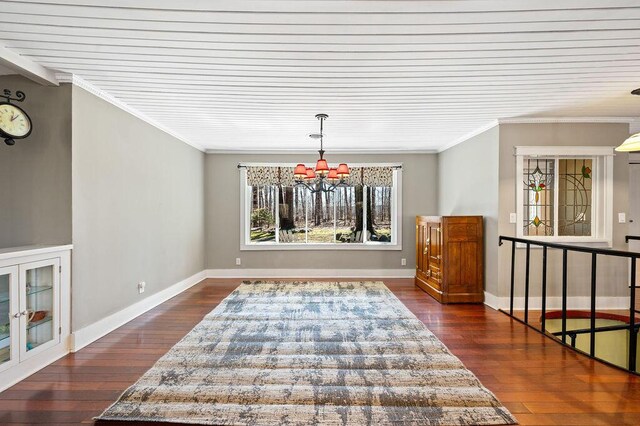 61914 M-51, Niles, MI 49120 - dining space with crown molding, a notable chandelier, and dark wood-style floors