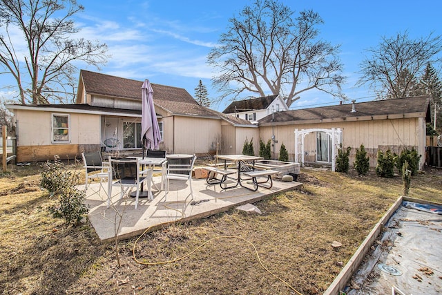 exterior space featuring a patio area and fence