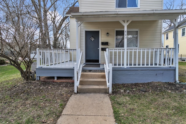 603 Gott St, Ann Arbor, MI 48103 - view of exterior entry featuring covered porch