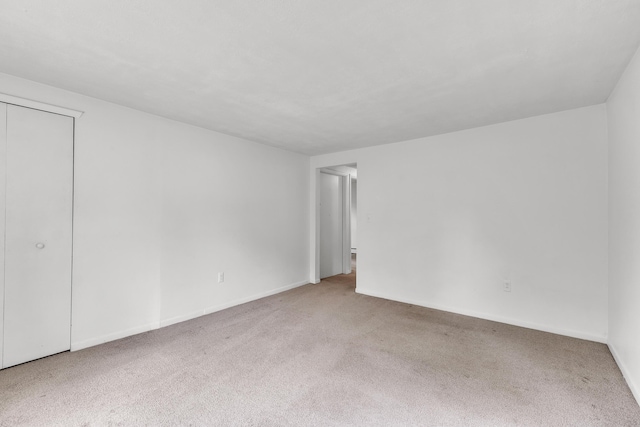 603 Gott St, Ann Arbor, MI 48103 - empty room with carpet flooring and baseboards