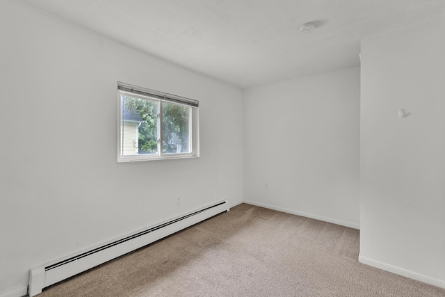 603 Gott St, Ann Arbor, MI 48103 - unfurnished room with baseboard heating, carpet floors, a smoke detector, and baseboards