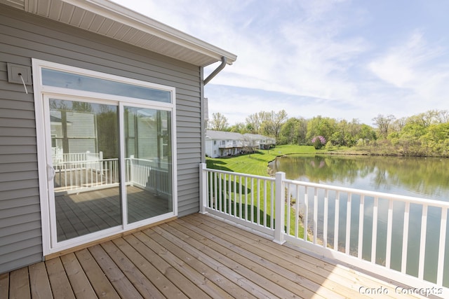 6627 Shoreside Ct SE, Grand Rapids, MI 49548 - wooden deck with a water view