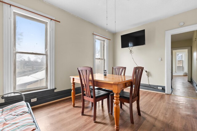 240 S Main St, Three Rivers, MI 49093 - dining area with light wood-style floors