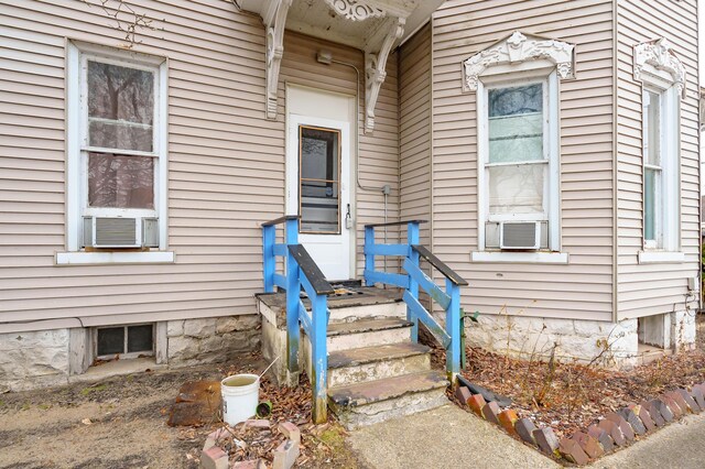 240 S Main St, Three Rivers, MI 49093 - view of exterior entry featuring cooling unit