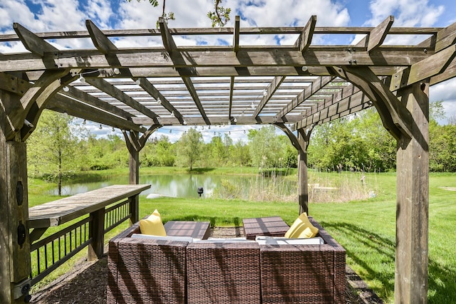 exterior space with a pergola and a water view