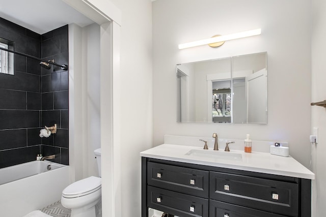 bathroom with plenty of natural light, toilet, shower / washtub combination, and vanity