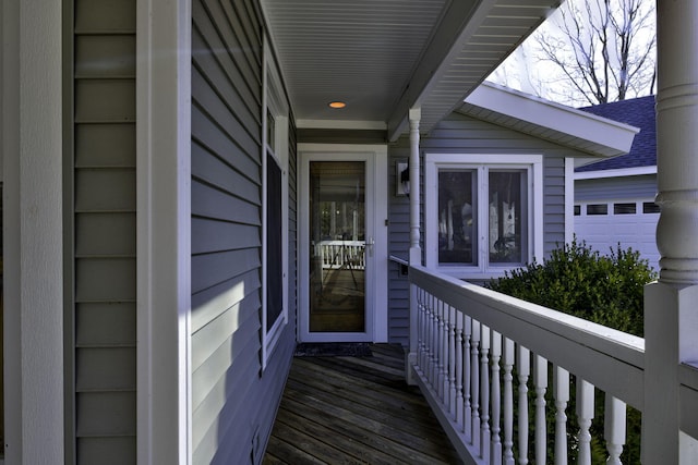 view of exterior entry featuring a garage