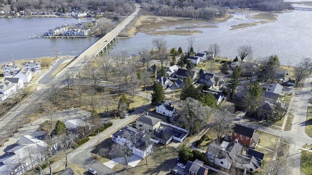 aerial view with a water view and a residential view
