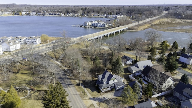 bird's eye view with a residential view and a water view