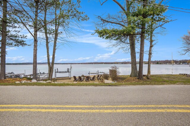7505 S Lakeshore Dr, Pentwater, MI 49449 - property view of water with a boat dock