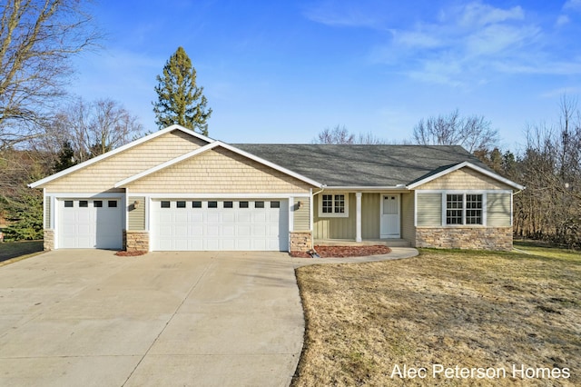 craftsman inspired home featuring stone siding and concrete driveway