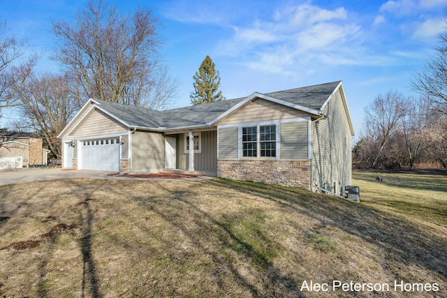 single story home featuring stone siding, an attached garage, concrete driveway, and a front lawn