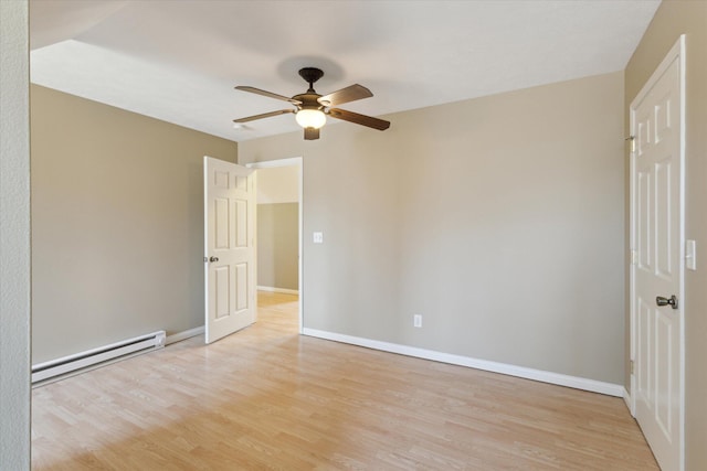 unfurnished room with a ceiling fan, light wood-type flooring, baseboards, and a baseboard radiator