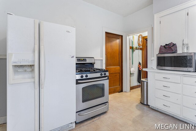 186 W 12th St, Holland, MI 49423 - kitchen featuring white cabinetry and stainless steel appliances