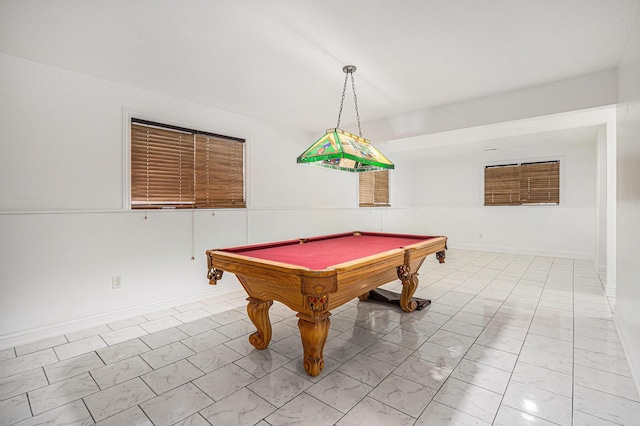 rec room featuring marble finish floor, pool table, and baseboards
