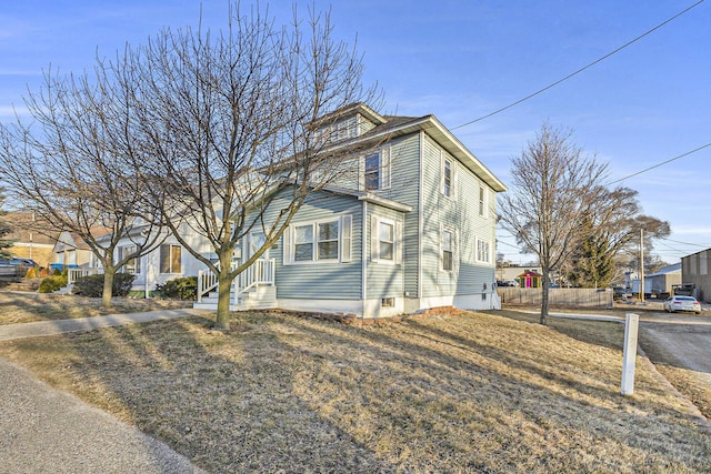 view of front of home with fence