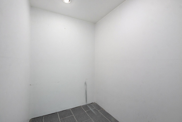 spare room featuring wood finish floors